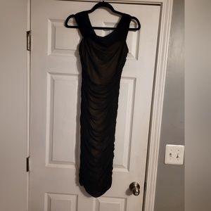 Sexy sheer black dress with lining. Gives the appearance of seduction.